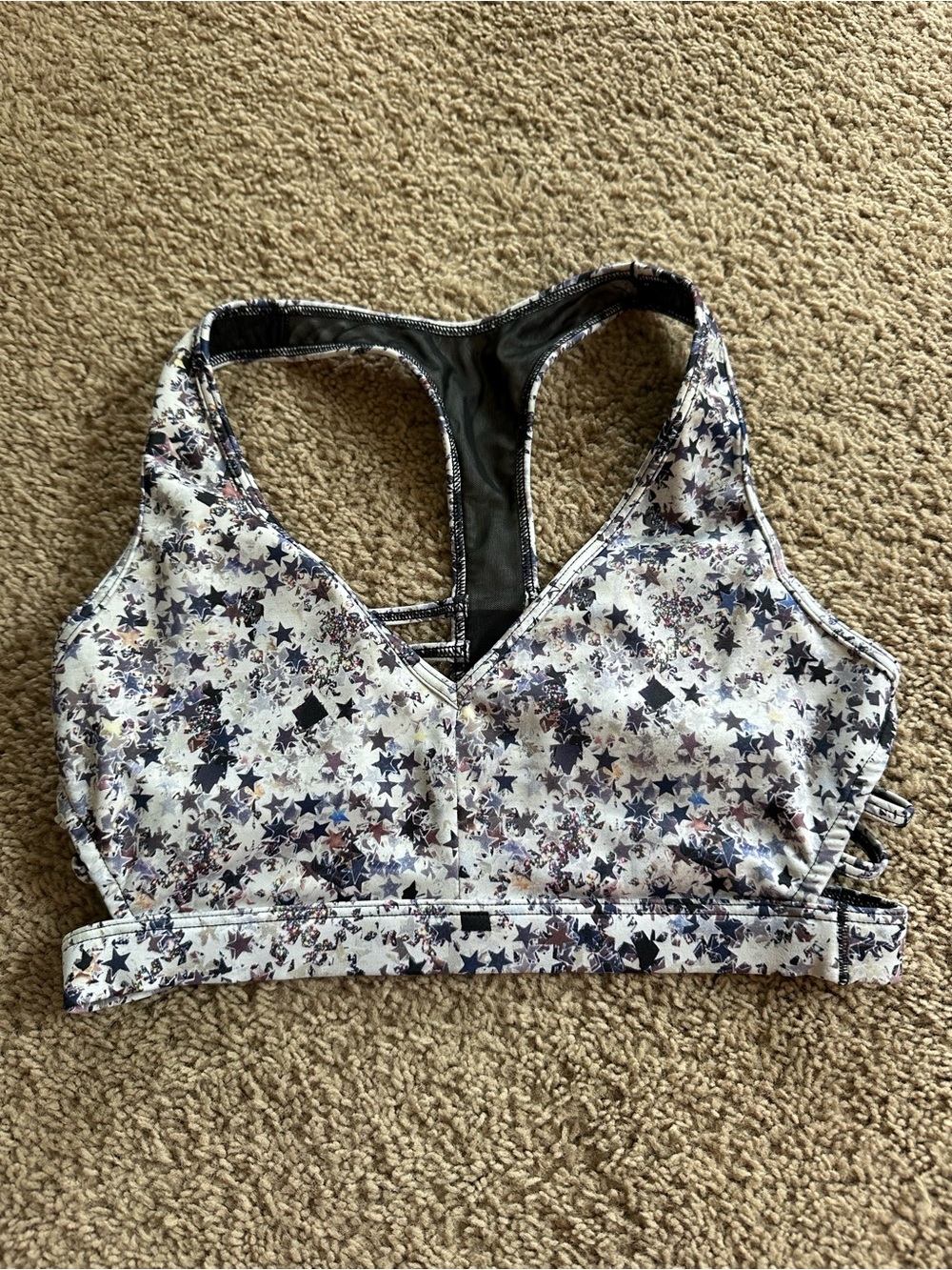Victoria Sport Star-Print Racerback Sports Bra.